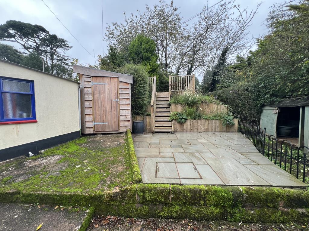 Lot: 96 - CHARACTER COTTAGE IN VILLAGE LOCATION - rear view of lower garden area